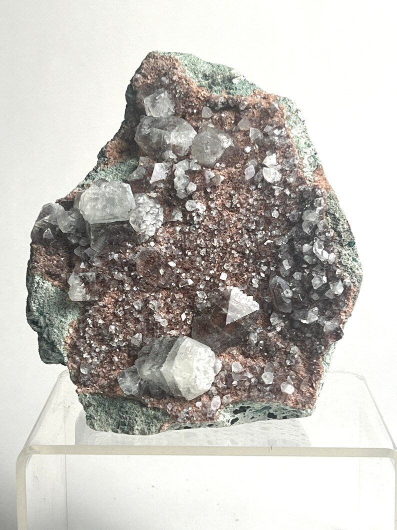 Red Apophyllite on Hematite Inclusions