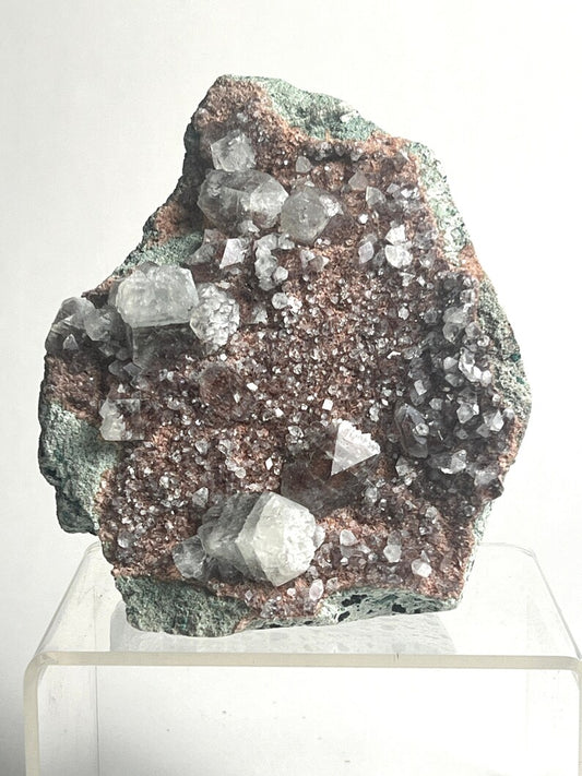 Red Apophyllite on Hematite Inclusions